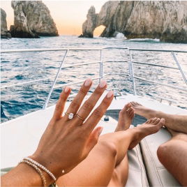 Example of a diamond on hand on vacation near water